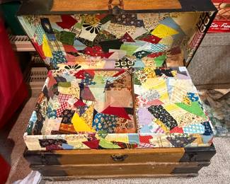 Antique wooden chest with patchwork interior