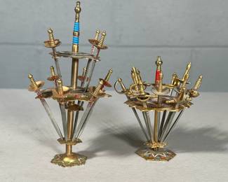 (2pc) SWORD TOOTHPICK HOLDERS | Set of 2 sword toothpick holders with 22 total metal sword form toothpicks - h. 6 x w. 3 x l. 3 in