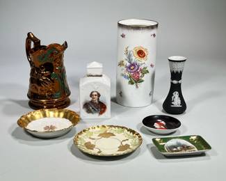 (8pc) Collection of Antique European Ceramics |
Including: Black Basalt Wedgwood Vase 6”,
2 Gilt Rimmed Limoges Plates 6”d
8” Italian Portrait of Dante Small Dish 4” d
Small Hunting Scene Pin Tray 4.50”. 19th Century Staffordshire Copper Pitcher Dancers 7.50” h. Rosenthal Floral Decorated Vase 9.50” h. Austrian Porcelain Flask Decorated with a Portrait of King Louis XV. Some pieces marked. - h. 6 x w. 3.5 x d. 2.5 in (Flask)