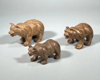 (3pc) C.M. COPELAND JR BEAR CARVINGS | Lot of 3 hand-carved bear figurines by C.M. Copeland Jr. all marked on bottom "An Original by C.M. Copeland Jr. Fitzgerald GA." - h. 4.25 x w. 3.5 x l. 7.5 in (largest)