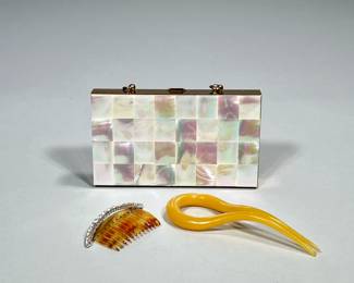 (3pc) Purse Compact And Hair Pieces | Vintage Mother of Pearl Minaudiere has mirror, compact, cigarette holder and lipstick holder inside. Does not look to be used inside. Vintage hairpins included one marked handmade. - h. 3 x w. 5.25 in (Purse)