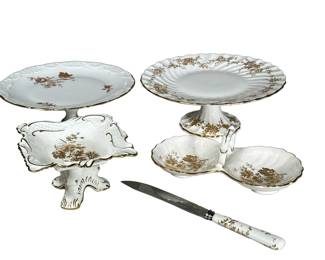 (5pc) English & French Porcelain & Other | Includes 2 cake plates, one Limoges, Hammersley & co footed dish and one porcelain handle knife. 10.5 in diameter 3.75 in height largest dish.