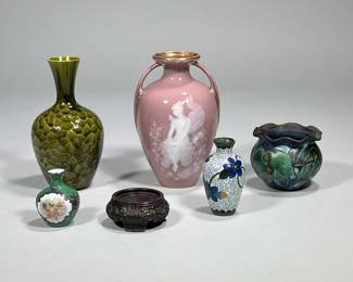 (6pc) Vases | Two small vases, one metal with blue flowers and one green with cherubs. Taller olive green vase is marked on bottom. Also included is a ceramic round small pot/bowl with wooden stand and mauve colored decorative ceramic vase with gold interior and white nymph/lady on front. Mauve vase is marked. - h. 7 x w. 5 in (Mauve Vase)