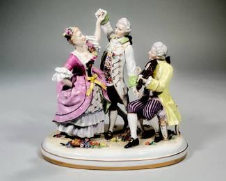 (1pc) Vintage German Schierholz Porcelain Figure Group | Comprising of a Dancing Couple with Musician Factory Mark to Base - h. 9.5 x w. 9.5 x d. 6 in