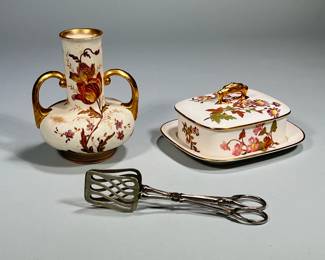 (3pc) Porcelain Pieces | Covered serving dish with gold trim. Marked plate is attached to dish. Compatible but not matching vase with gold handles is also marked. Metal serving utensil marked Vom Cleff and Company, Germany. - h. 7.5 x w. 6 in (Vase)
