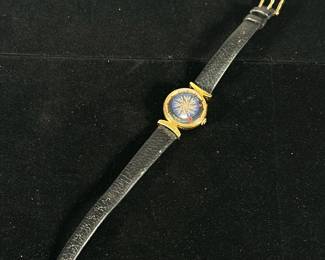 ERNEST BOREL COCKTAIL KALEIDOSCOPE WATCH |
Featuring black dial with blue rotating kaleidoscope center and clear back with leather band
