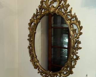 Ornate gold mirror.....