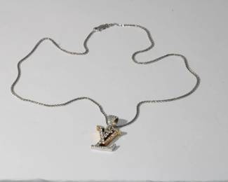 14k yellow and white gold Louis Vuitton logo pendant encrusted with round brilliant cut diamonds 9.35 grams