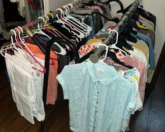 LARGE DOUBLE-RACK OF CLOTHING