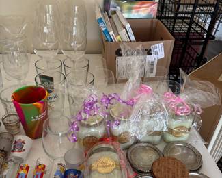 Candles, shot glasses, coasters, cookbooks