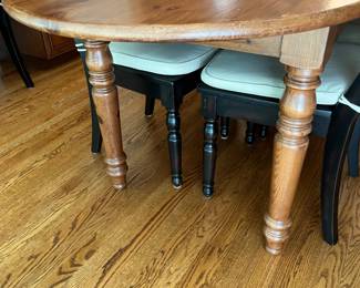 PRESALE Oval pine table 35w x 78l x 30h + Set of 7 Pottery Barn Harvest side chairs in Restored black w/ neutral cushions. 19”w seat