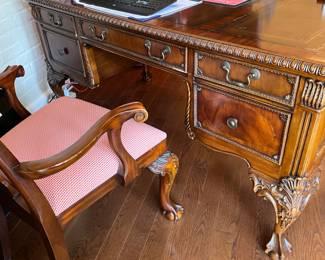 Large writing desk & chair, carved wood w/ claw and ball feet, 4 drawers, 62w x 32d x 30h.