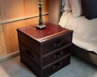 Leather wrapped 3 drawer trunk style nightstand. Restoration Hardware