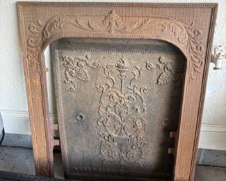 Antique cast iron fireplace surround/plate