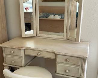 Wooden vanity with triple mirror and padded seat