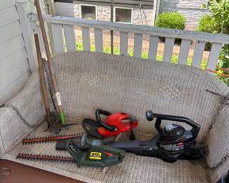 vintage wicker porch swing/outdoor tools