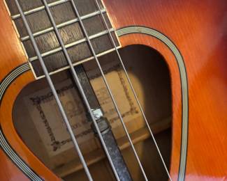 Custom-made 1990s Hohner TWP600B acoustic bass. Pearl inlay of owner's last name.