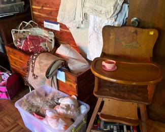 Vintage cedar chest and child’s highchair