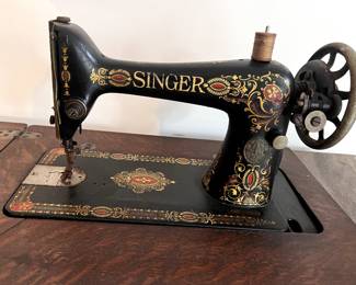 Antique Singer Treadle Sewing Machine with Ornate Wood Cabinet