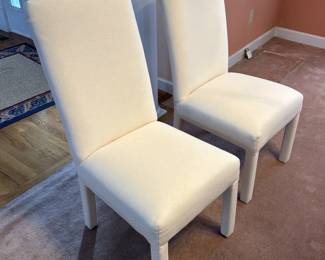 Two Arhaus parson chairs. Slipcovers have been removed. Both are very clean.