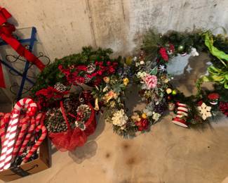 Christmas decor and variety of wreaths.