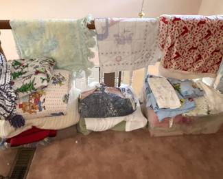 Lots of throws, blankets, afghans, and quilts.