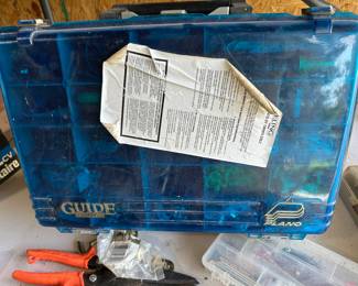 Toolbox full of electrical supplies.