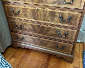 Antique 4 drawer chest with inlays.