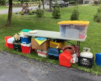 Lots of coolers , set of dinner dishes ,propane tank