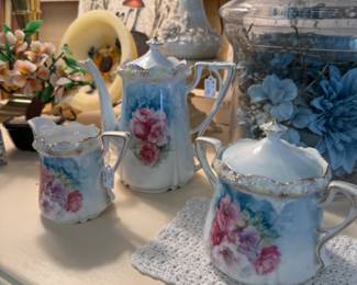 Old tea pot, sugar and creamer.