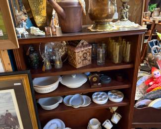Brass, glassware, and art.