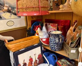 Chicken decor, pottery pitchers and framed prints.