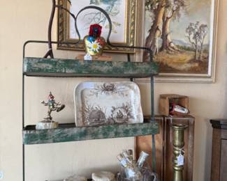 Prints, framed art, platters, old brass candlesticks.