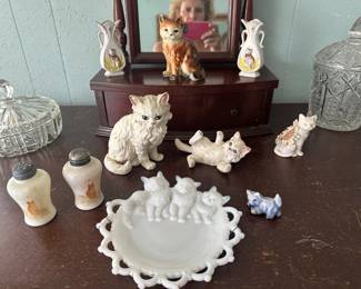 Antique cat salt-pepper shaker set, antique milk-glass cat plate, and cat figurines plus cut-glass jars with lids