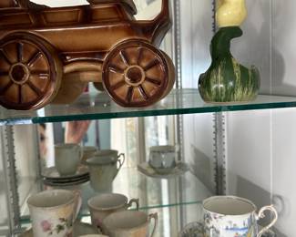 Antique Hull wagon-wheel planter and matching set of antique cups and saucers