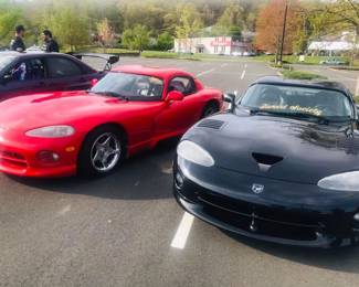 to Dodge Vipers Red 93, 57,000 miles black 2000 both have hard tops. The black one has a GT top worth $7500 by itself.