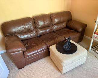 PRE-SELL item leather pull out sleeper sofa priced at 50.00.