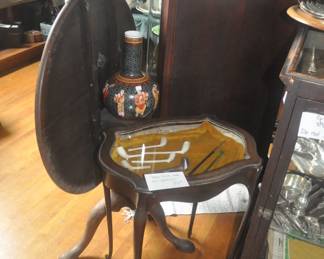 Old clay pipes and French walnut vitrine