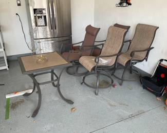 Patio tables and two chairs