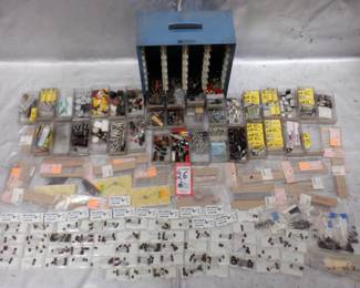 LOT PARTS IN BIN AND BOXES INCLUDING CAPACITORS, AND MORE