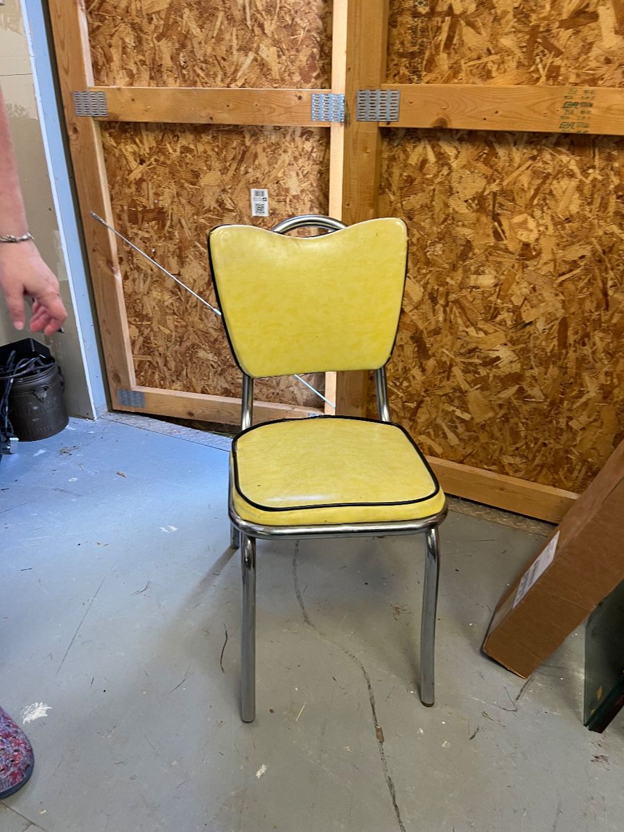 3 yellow and chrome chairs