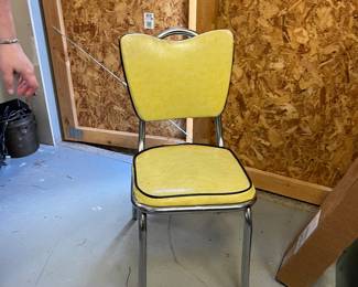 3 yellow and chrome chairs