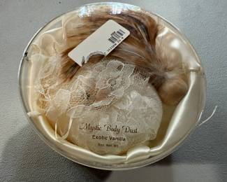 Romantic powder and feather applicator