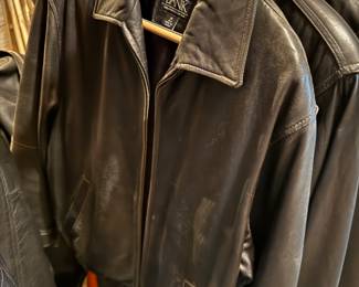 Several men’s leather bomber jackets