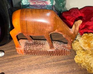 Feeding deer wooden sculpture
