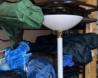Over a dozen folding chairs
