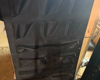 Gun holder panel for safe or safe room