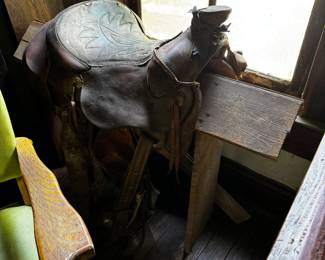 Vintage Saddle and stand. Old, great condition.