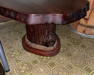 True wooden stump side table. It’s solid!