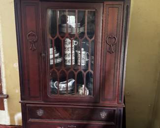 China cabinet with matching dining table and buffet.